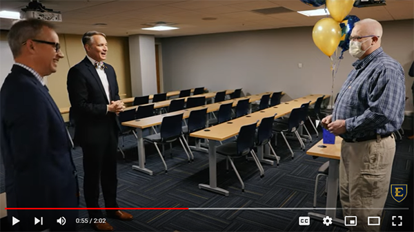 Screenshot of a video overview of the ETSU Heroes Award. The image shows ETSU President Brian Noland and Jeremy Ross speaking with an ETSU Hero.