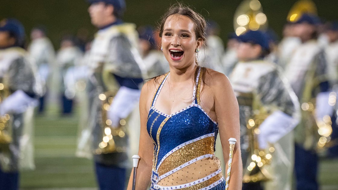 An ETSU majorette smiling with surprise after she received news that the majorettes and flag core have been selected to perform at the Radio City Music Hall Christmas Spectacular. 