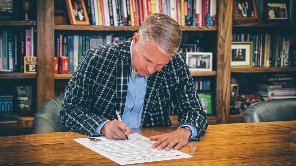 President Brian Noland signs a proclamation declaring September “Suicide Awareness Prevention Month” at ETSU. 